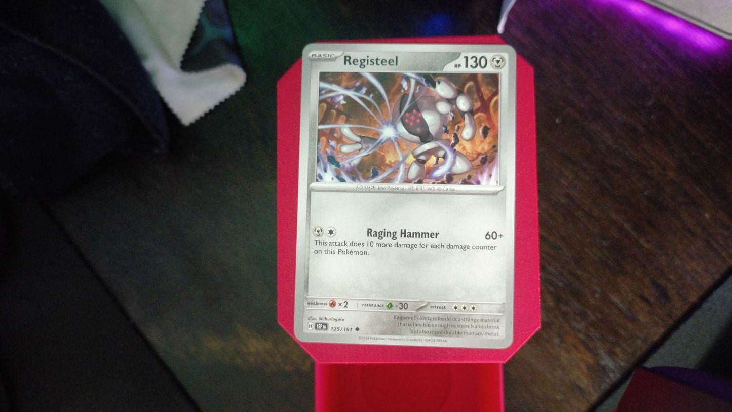 Registeel 125/191 Surging Sparks Pokemon UC NM