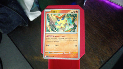 Victini 021/191 Surging Sparks Pokemon UC NM