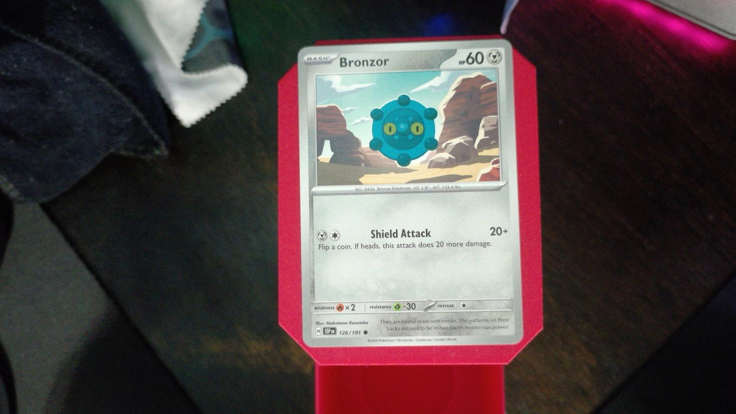 Bronzor 126/191 Surging Sparks Pokemon C NM