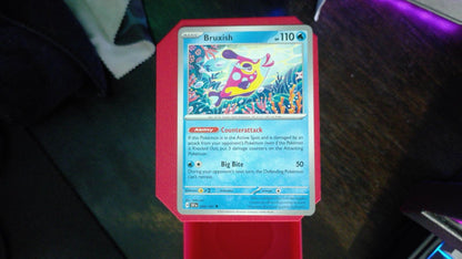 Bruxish 049/191 Surging Sparks Pokemon UC NM
